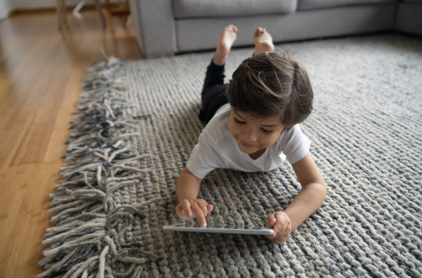 Girl laying on rug | Chesapeake Family Flooring