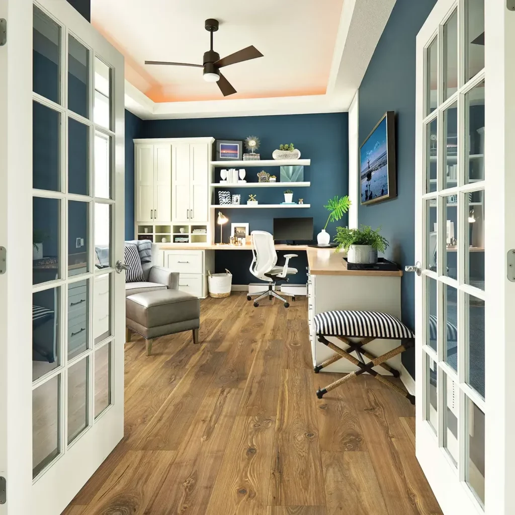 Laminate in a medium brown wood tone in a home office | Chesapeake Family Flooring